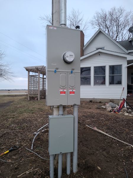 Meter and service equipment mounted on a post